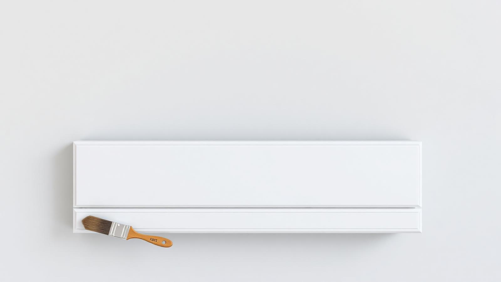 Radiator schilderen Nijmegen - witte radiator met professionele kwast door L.T.J. Schilderwerken